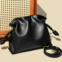 Sac pochette à bandoulière