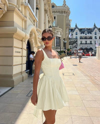 Mini robe avec col à nœud papillon