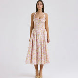Robe mi-longue évasée, dénudé au dos